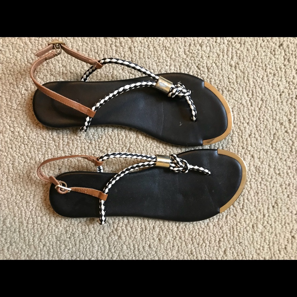 Black and white crossed sandals
